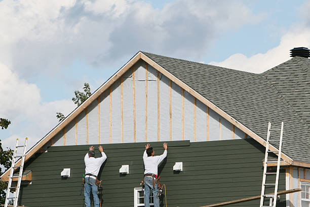 Professional Siding Installation technician working in Bellevue, OH